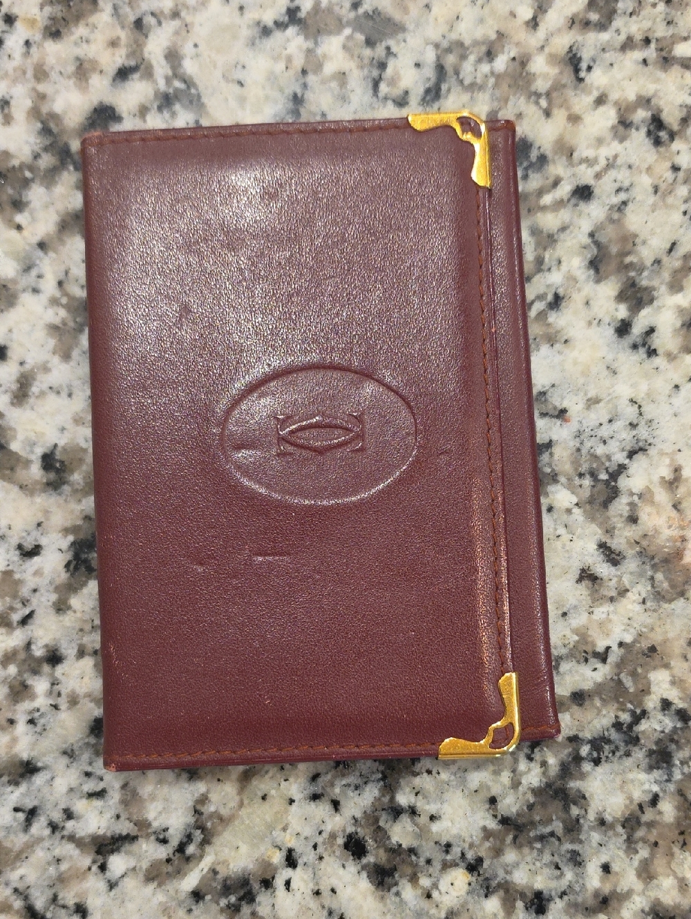 Cartier Burgundy Leather Wallet with Gold Corner Accents